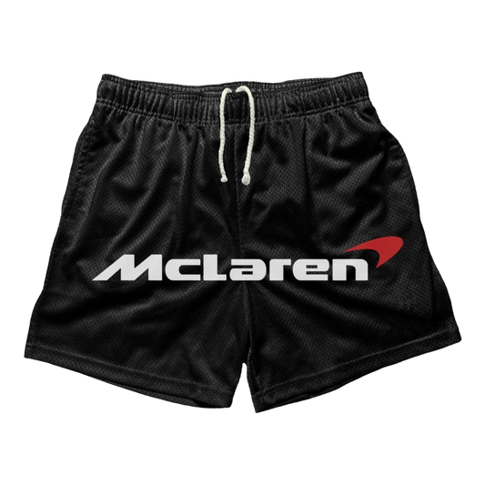 a black shorts with the word mcaen printed on it