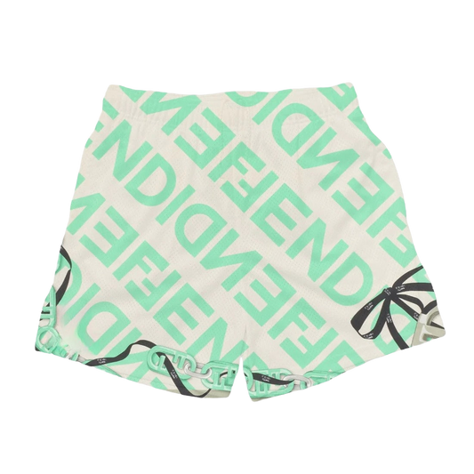 a pair of green and white shorts with a black and white print