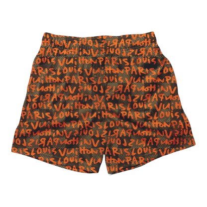 an orange and black shorts with words written on it