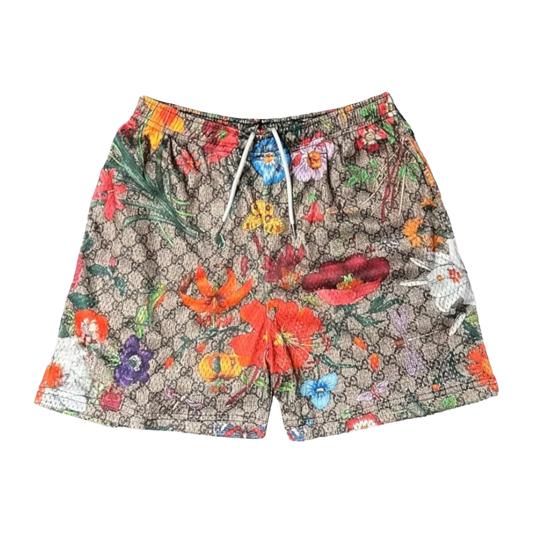 a pair of shorts with flowers on it