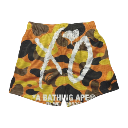 a bathing ape shorts with a camouflage print