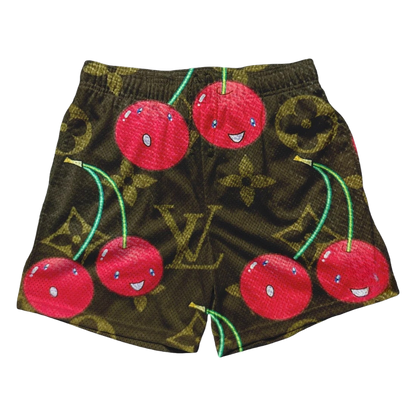 a pair of shorts with cherries on them