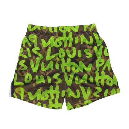 a green and black shorts with letters on it