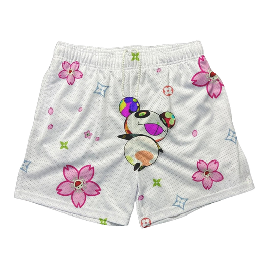 a white shorts with pink flowers on it