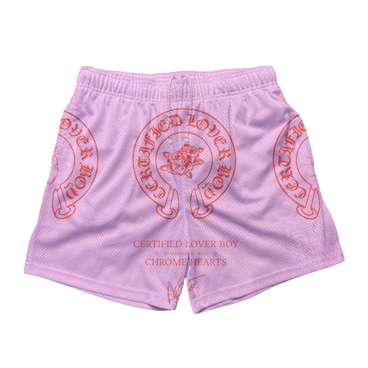 a pink shorts with a red and white design on it